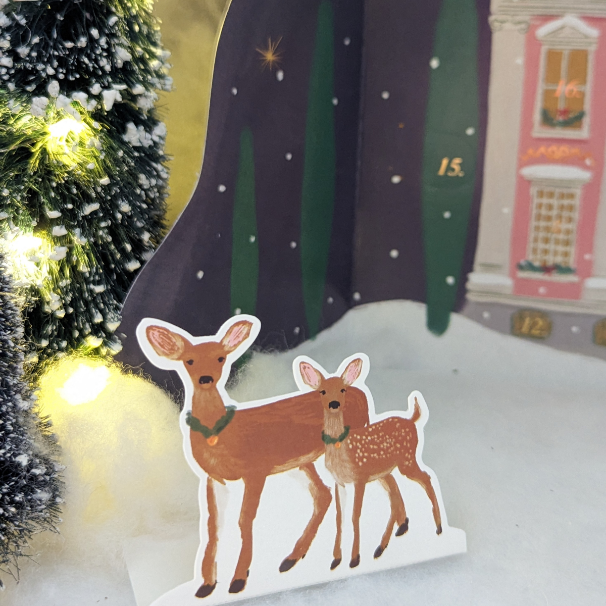 Calendrier de l'Avent Manoir avec des biches dans le parc.