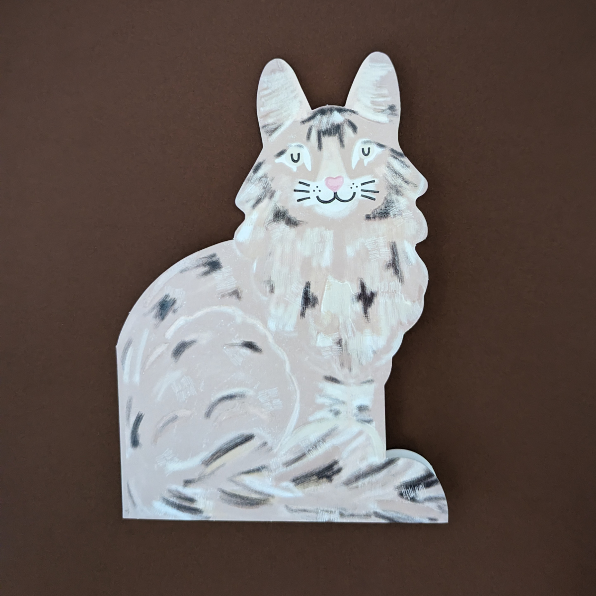 Le vernis , le gaufrage et la découpe mettent en valeur les traits adorables de ce petit chat. Il apportera beaucoup de joie à votre destinataire.