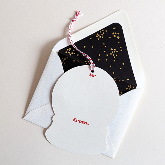 Carte Happy Christmas découpée en forme de boule à neige. Dessinée par The First Snow.