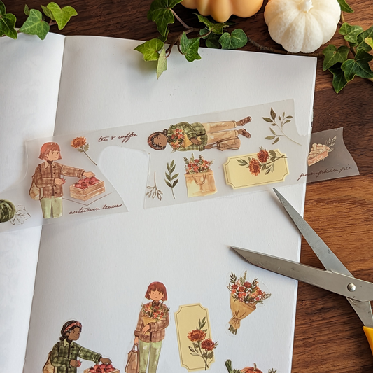 Des illustrations à l'aquarelle dessinées à la main de deux filles faisant leurs courses au marché ont été représentées.