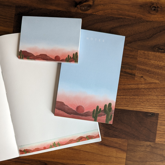 Post-it avec illustration d'un coucher de soleil sur un parc de cactus.