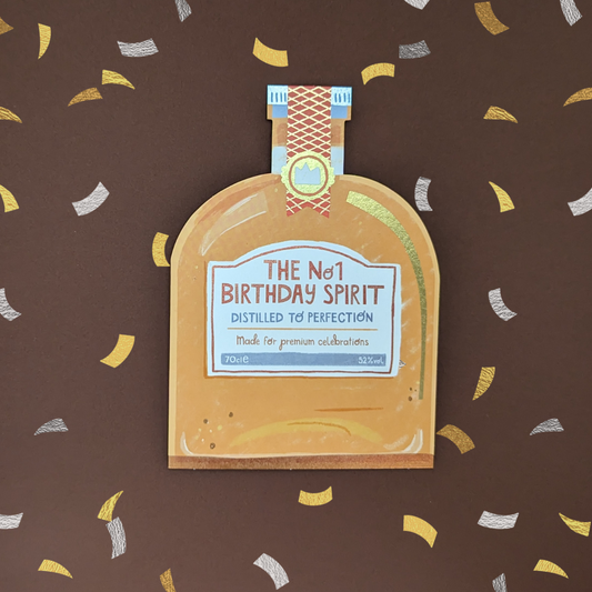 Carte d'anniversaire en forme de bouteille avec de la dorure et un jeu de mot anglais écrit sur l'étiquette de la bouteille pour souhaiter un bon anniversaire à un de vos proches. 