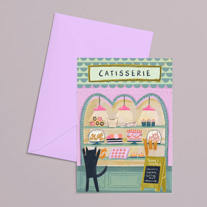 Carte de vœux illustrée avec un chat devant une pâtisserie, illustration originale Niaski.