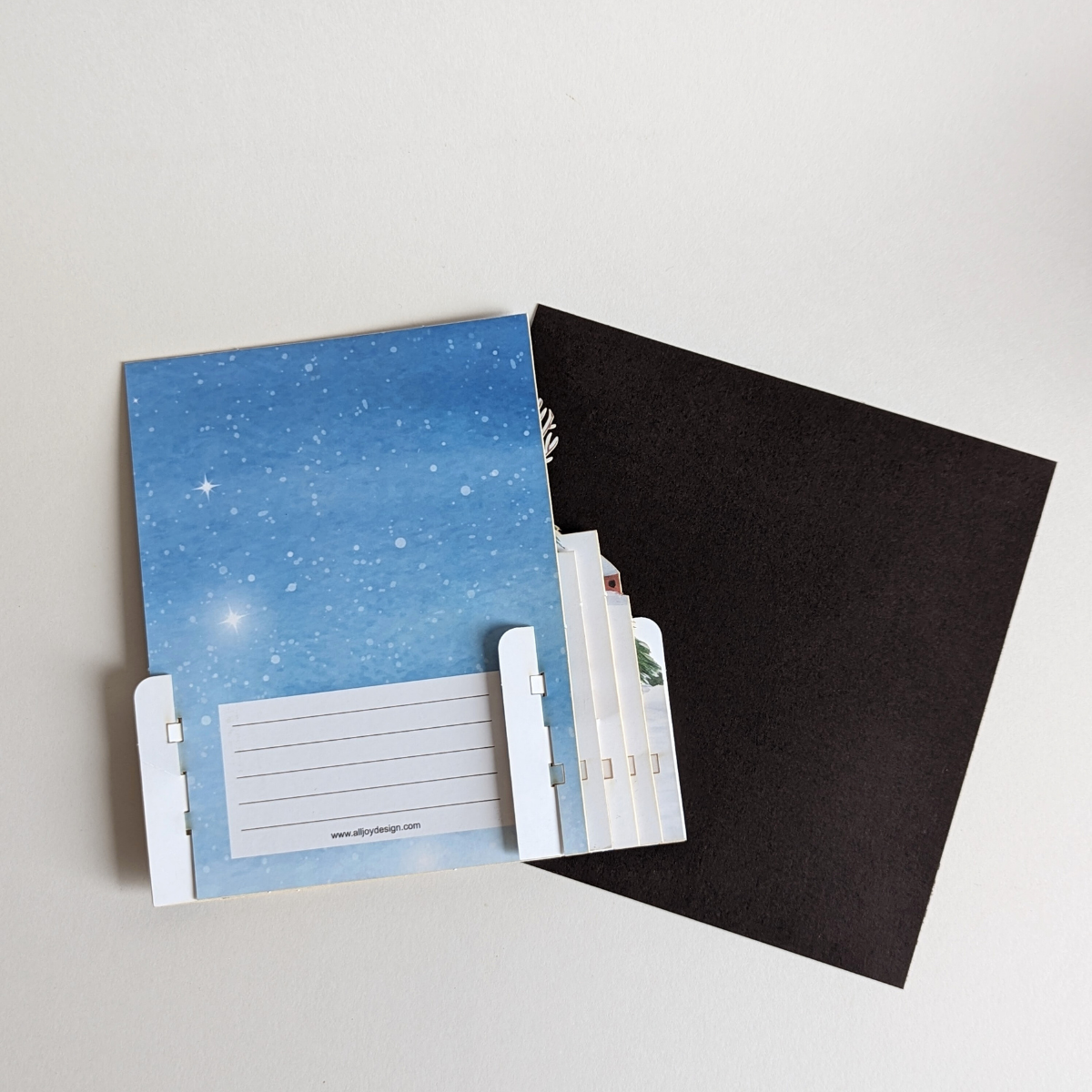 Vous pouvez ajouter un message chaleureux et personnalisé au dos de la carte pour partager vos vœux festifs.