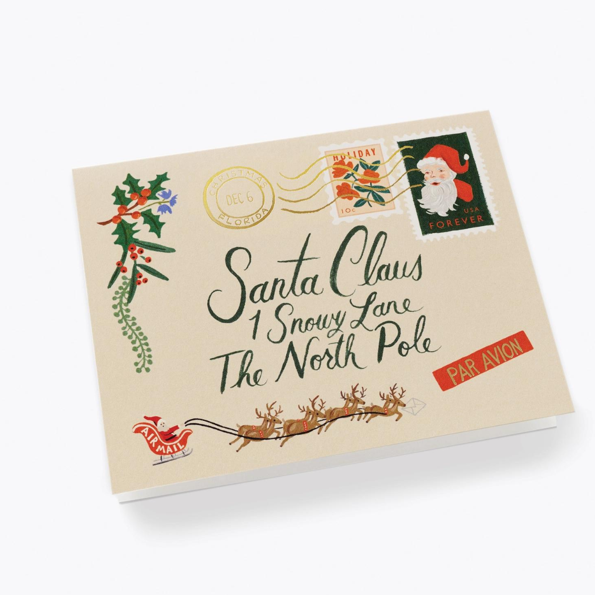 Cette très belle carte conçue comme une enveloppe adressée au Père Noël, ajoute une touche de fantaisie à vos vœux.