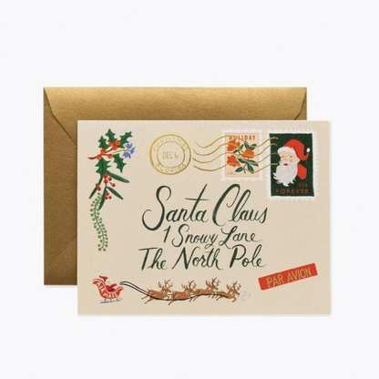 Les jolis timbres et le cachet de la poste estampé à la feuille d'or sont des détails méticuleusement conçus pour évoquer la magie de Noël.
