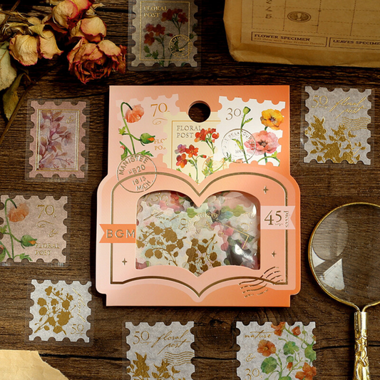 Pochette de 45 stickers en forme de timbre poste avec des fleurs.