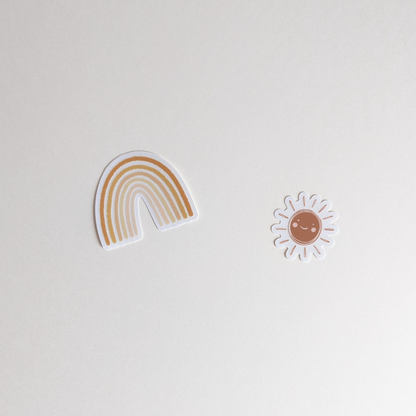 Ces stickers vous invitent à créer votre propre arc-en-ciel de bonheur, où le soleil brille toujours.